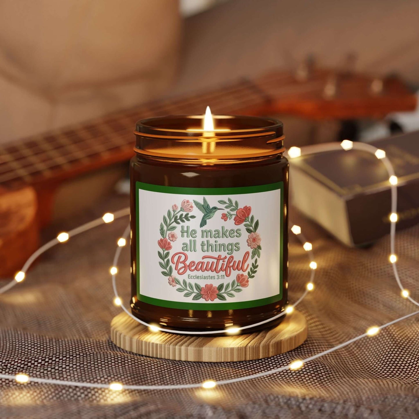 Beautifully God Vegan Soy Candle with floral design and warm glow, placed on a wooden holder, surrounded by soft lights.