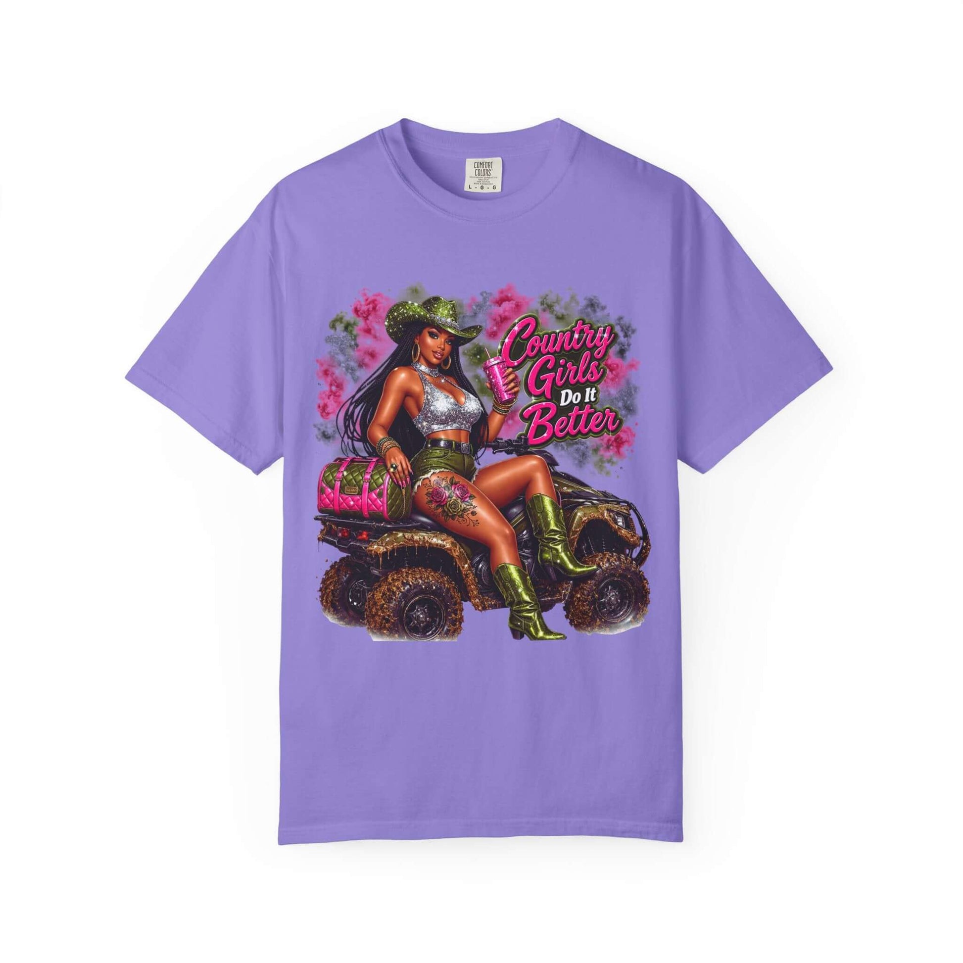 Cowgirl Sassy Graphic Tee featuring a woman on an ATV in a purple shirt with country-themed graphics.