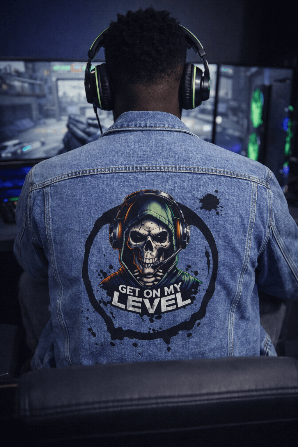 Gaming Person wearing a denim jacket with a skull design and text, sitting in front of PS5, Xbox.