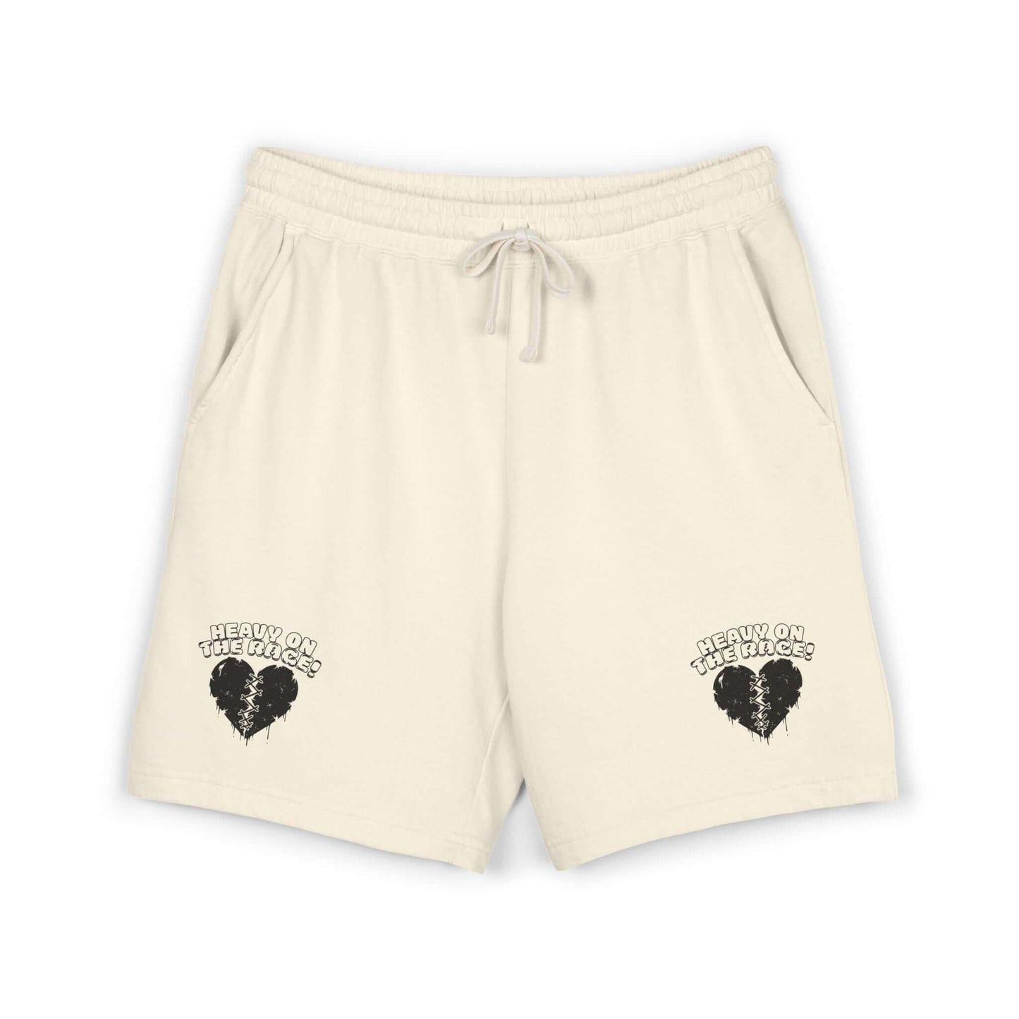Heavy on the Rage comfortable athletic shorts in light beige with graphic designs and side pockets.