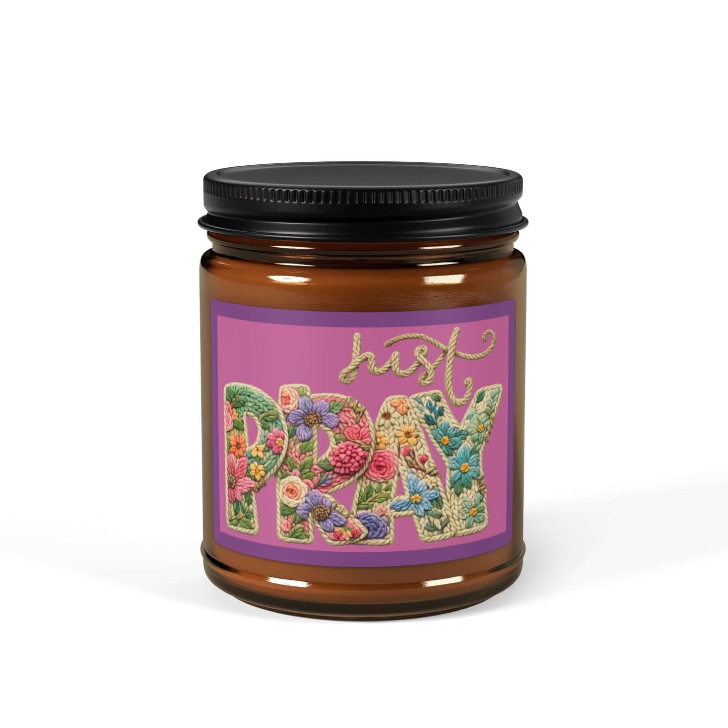 Just Pray Vegan Soy Candle in amber jar with floral design and black lid.