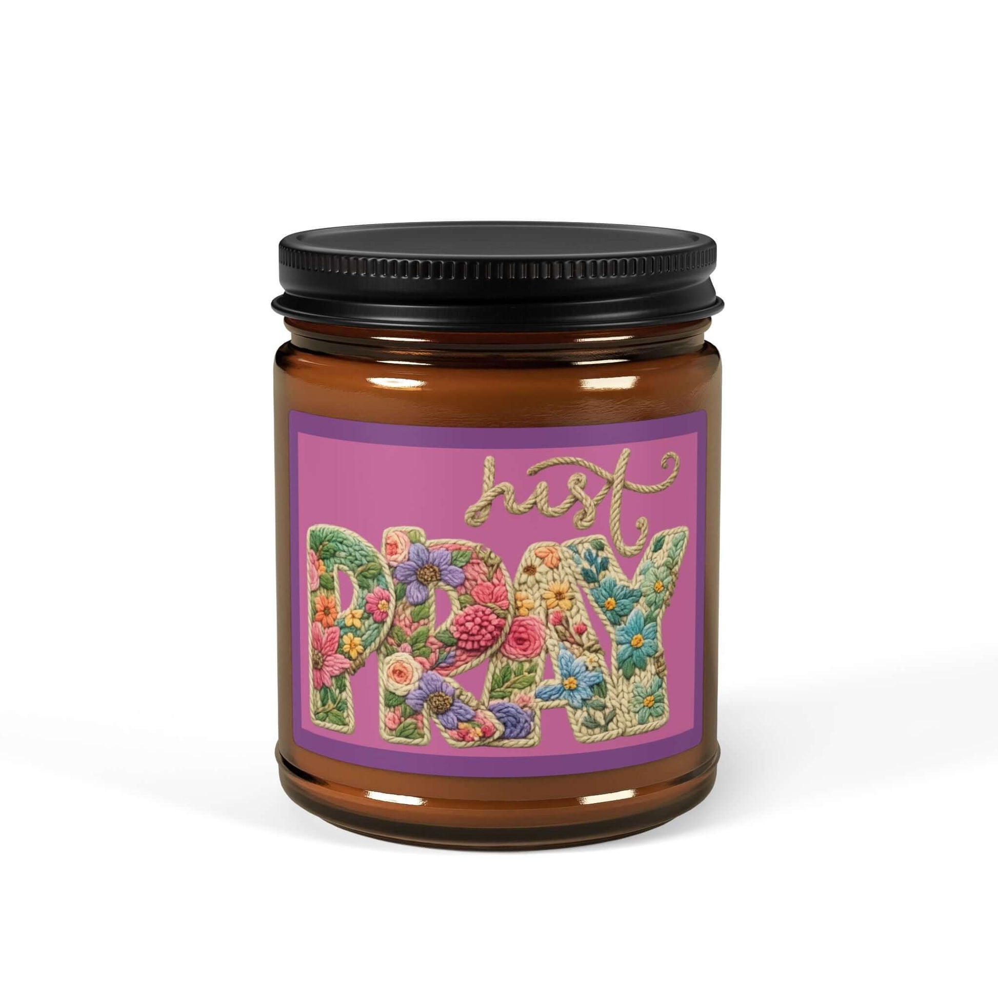 Just Pray Vegan Soy Candle in amber jar with floral design and black lid.