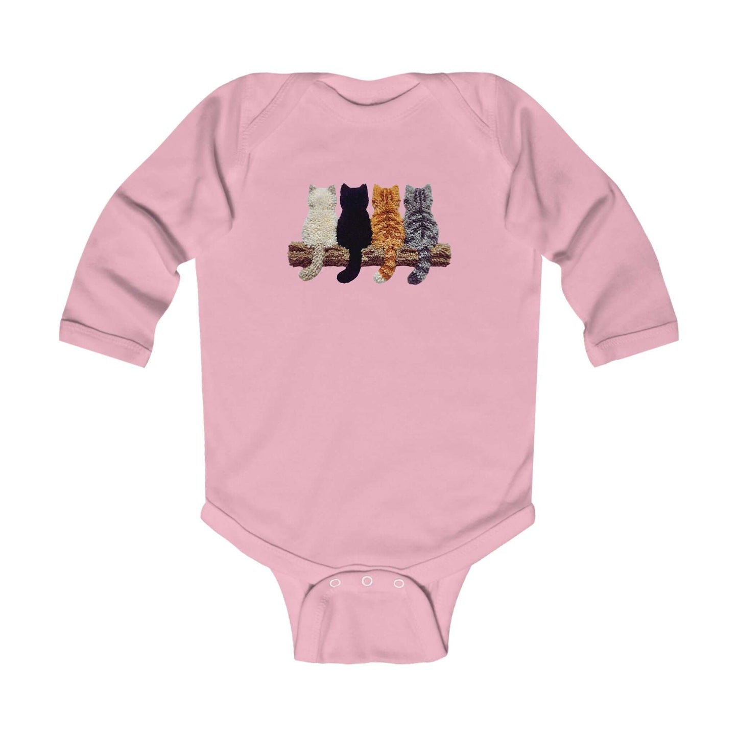 Lovely Kittens faux yarn long sleeve bodysuit with playful kitten motifs on a pink background.