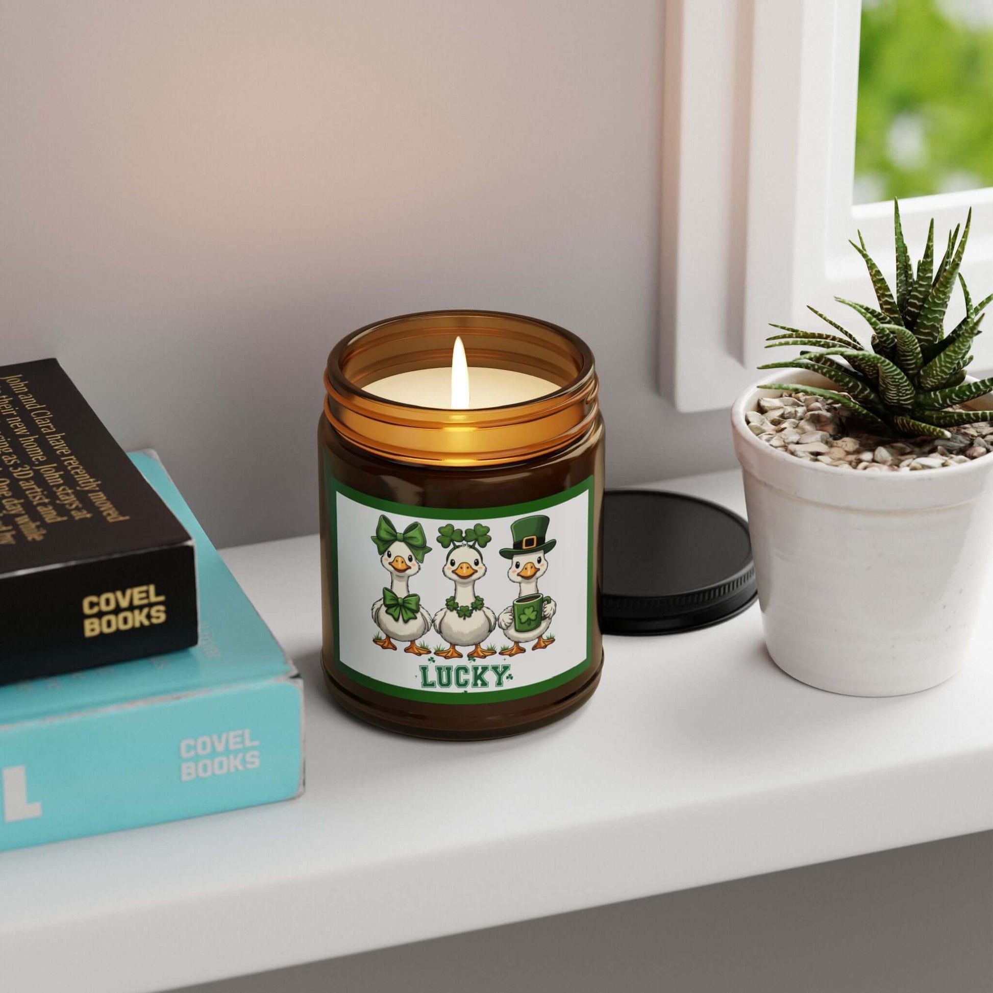 Lucky Ducks Vegan Soy Candle in amber jar with playful label, perfect for St. Patrick's Day decoration.