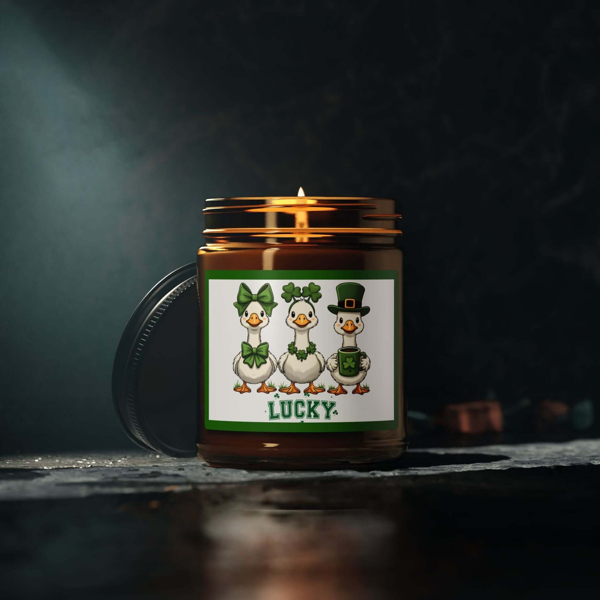 Lucky Ducks Vegan Soy Candle in amber glass jar featuring playful ducks for St. Patrick's Day.