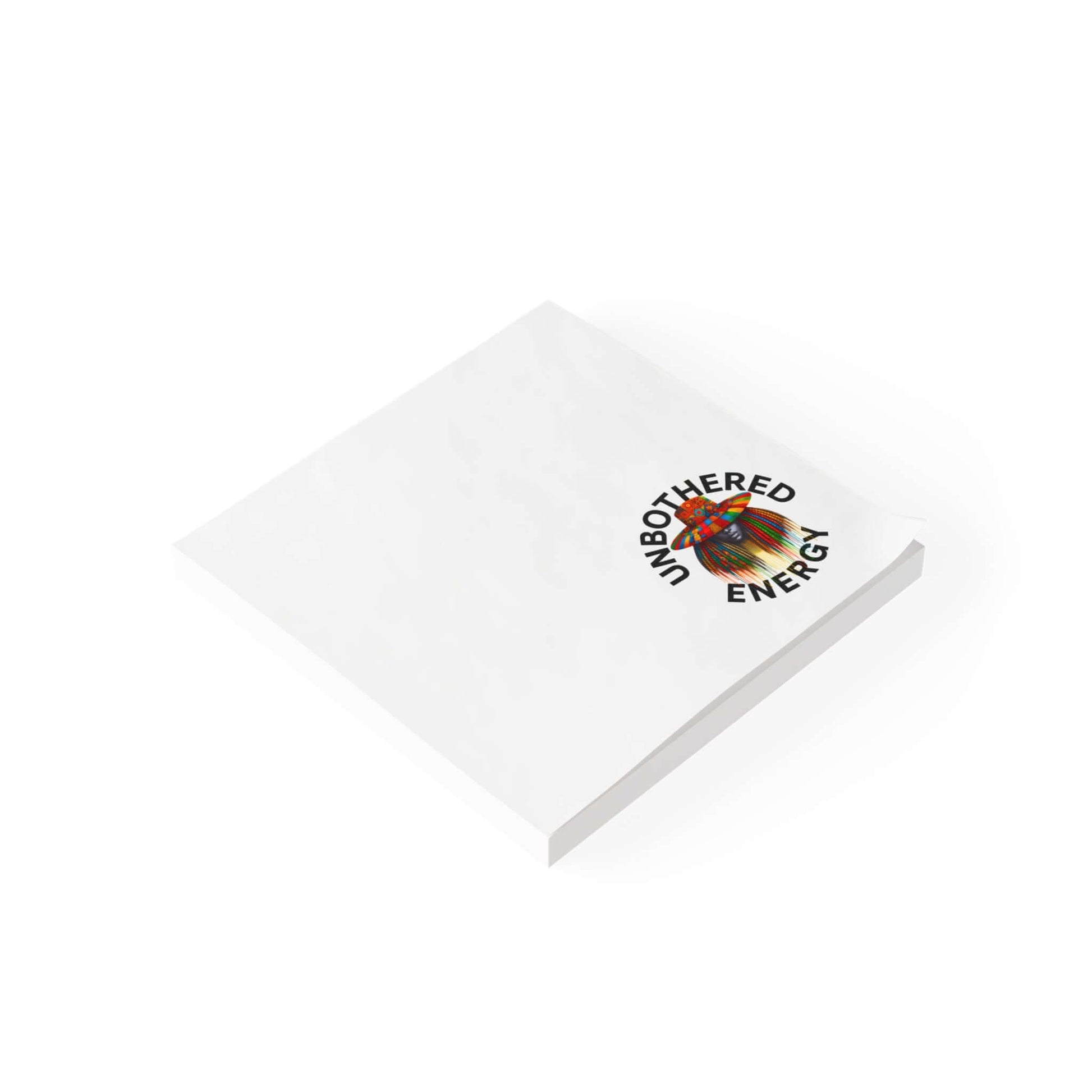 Unbothered Energy Post-it Note Pads featuring a colorful emblem on a compact, white notepad.